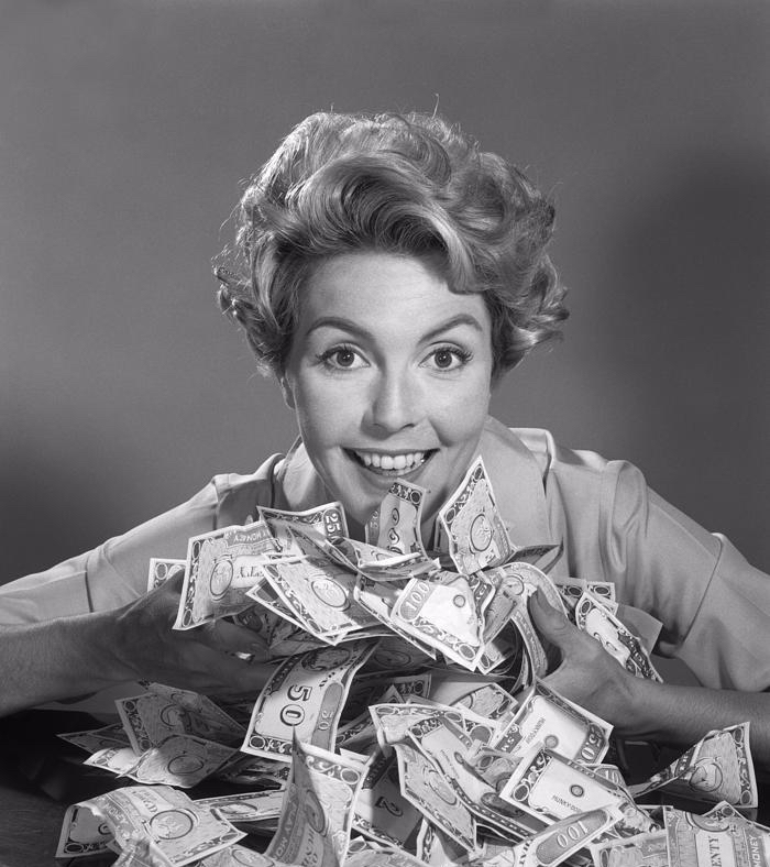 woman-with-money-c1950-60s-debrockeclassicstock